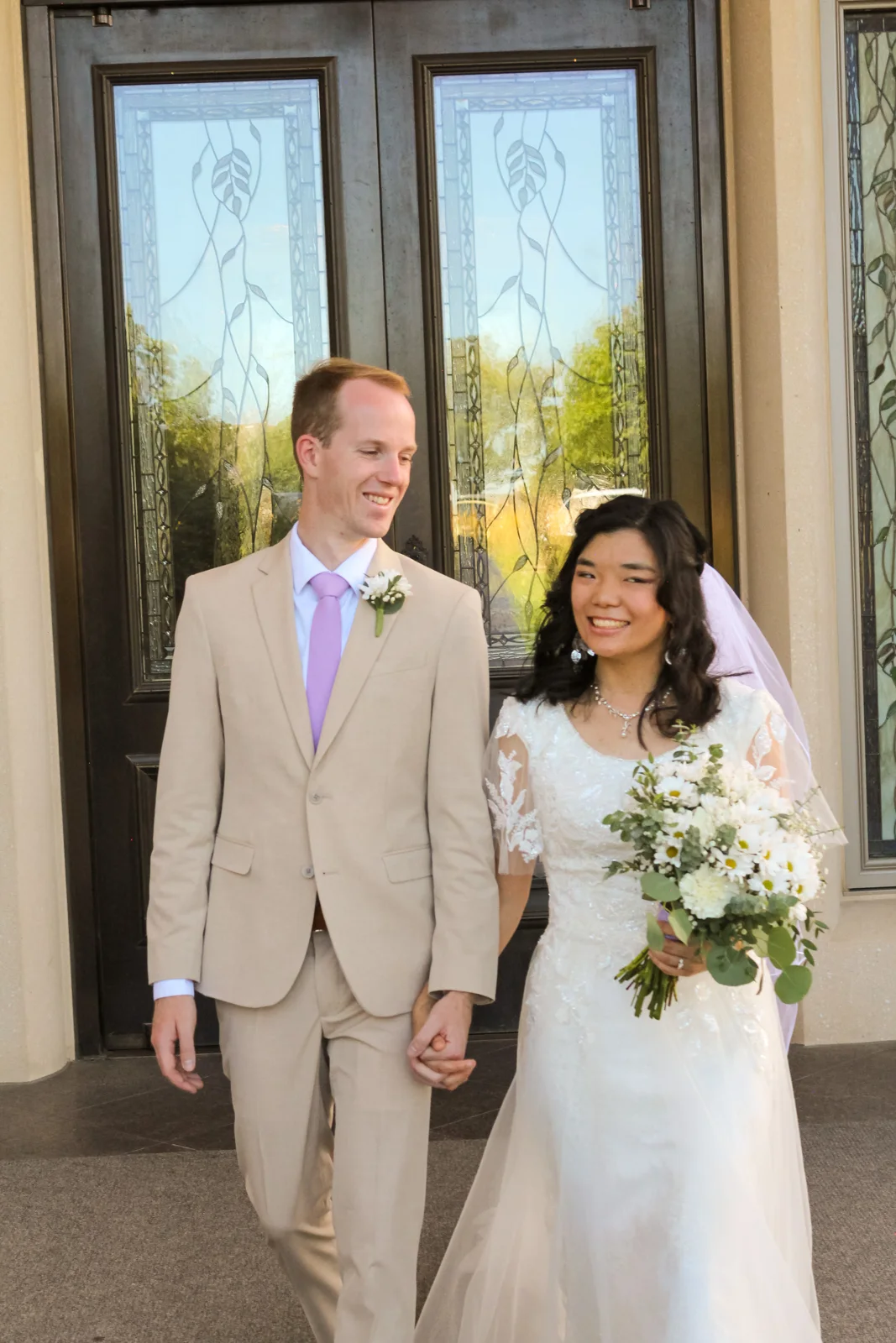 Wedding couple outside the temple